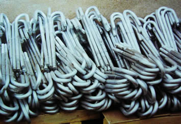 Bundles of anchor bolts are stored in the warehouse